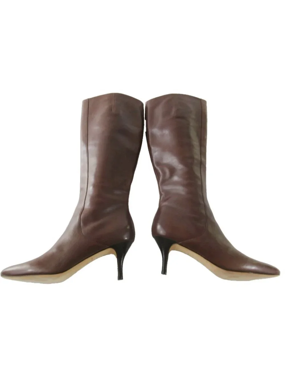 Cole Haan boots shown